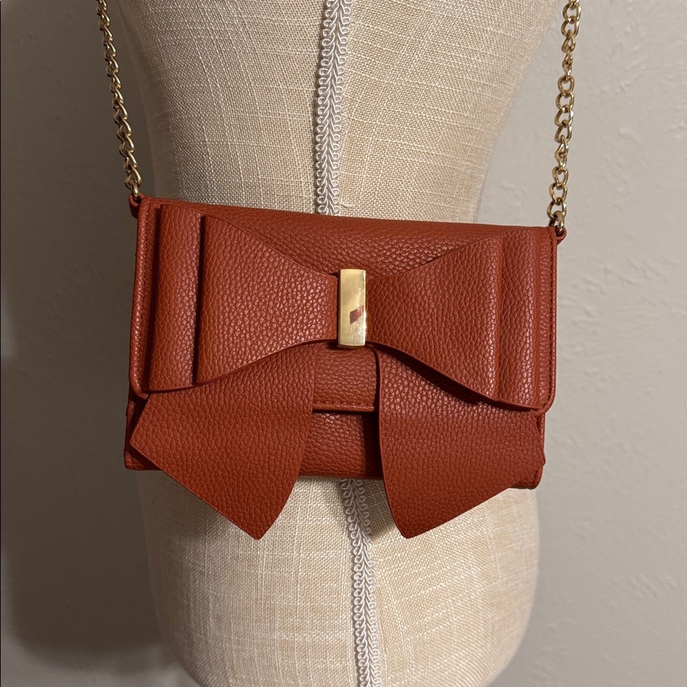 Bow Accent Crossbody Bag in Rust Brown with Gold Chain